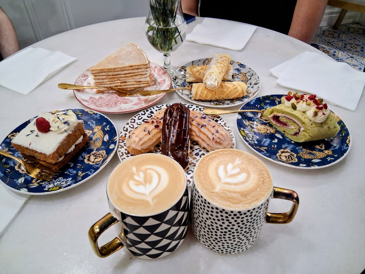 Fresh European pastries and two specialty lattes with latte art at Café Magnolia in Kennewick