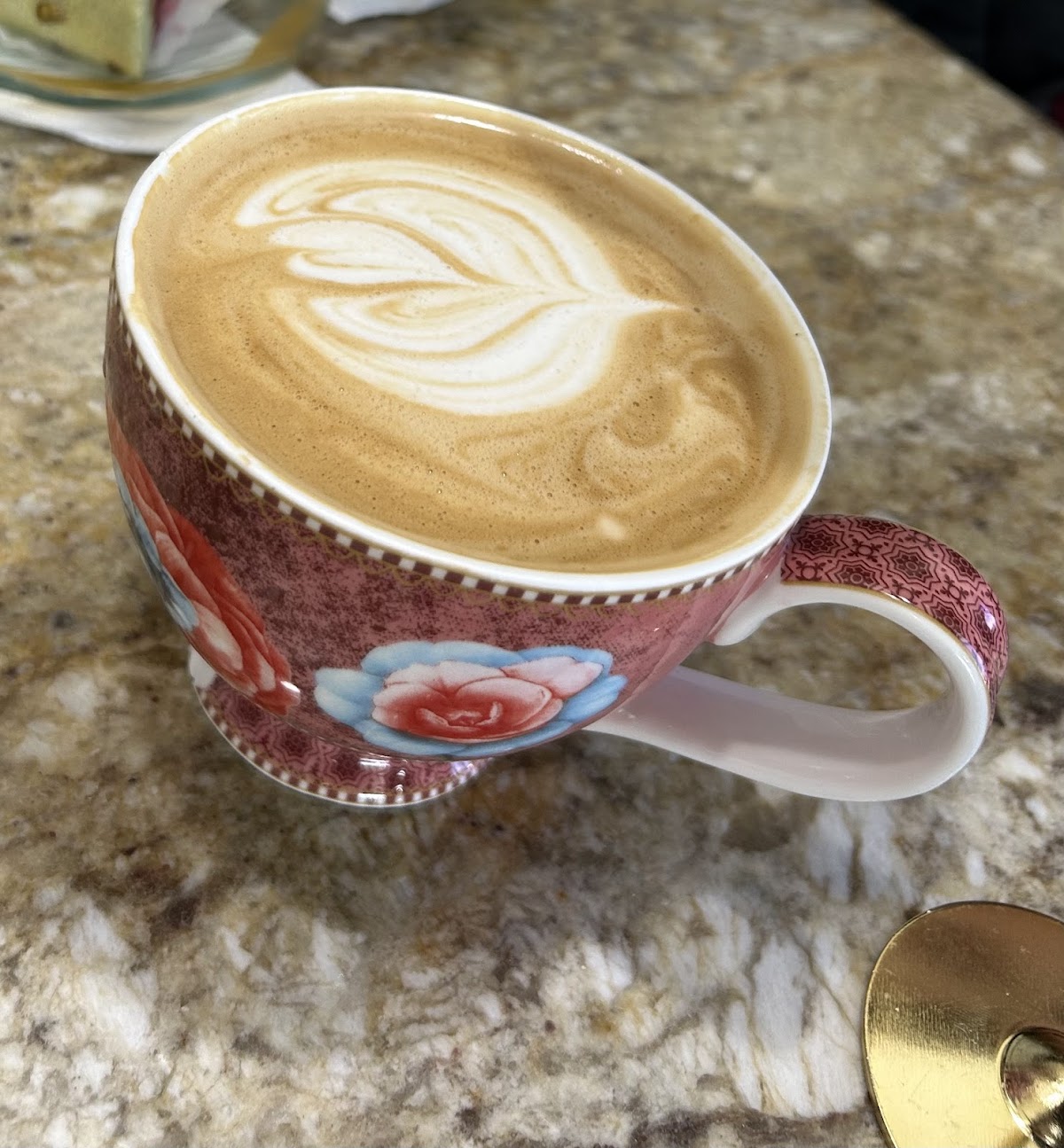 A specialty latte with rosetta latte art at Café Magnolia